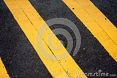 Asphaltic concrete road background and traffic sign