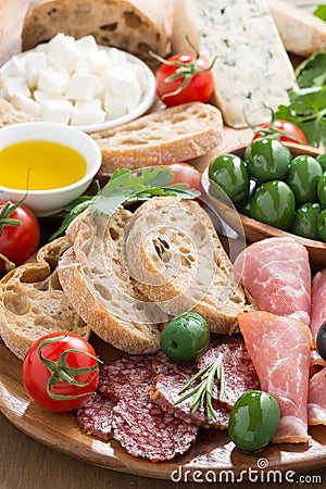 Assorted Italian antipasti - deli meats, fresh cheese, olives