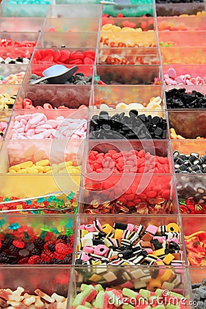 Assortment of candies in transparent boxes