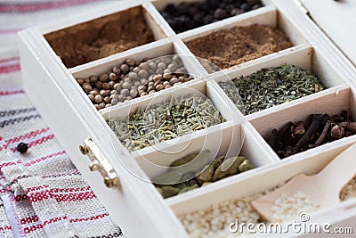 Assortment collection of spices and herb in wooden box, food