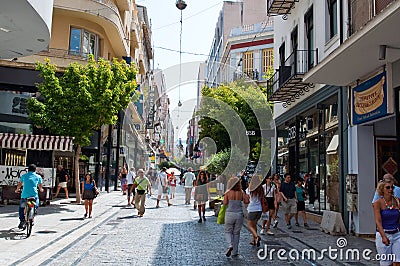 ATHENS-AUGUST 22: People shop on Ermou Street on August 22, 2014 in Athens, Greece.