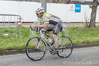 An athlete cycles in the Cologne