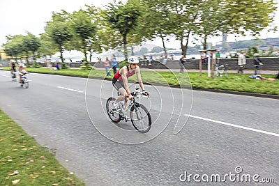 An athlete cycles in the Cologne