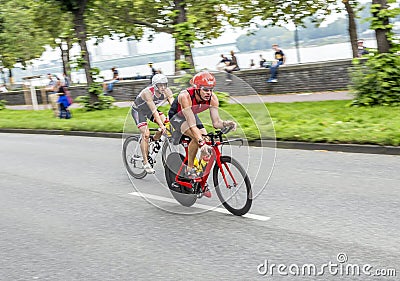 An athlete cycles in the Cologne