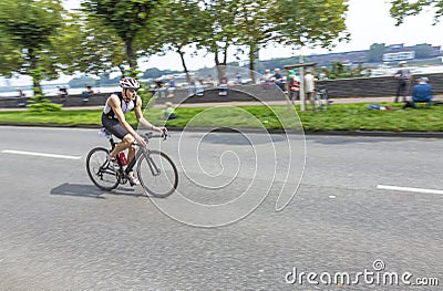An athlete cycles in the Cologne