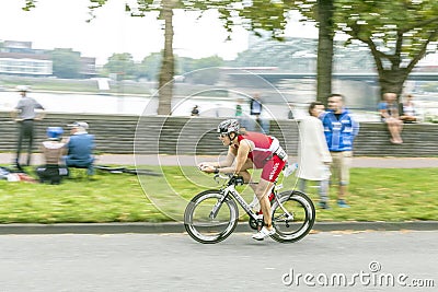 An athlete cycles in the Cologne