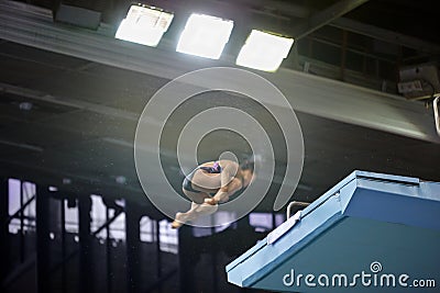 Athlete jump from diving-tower
