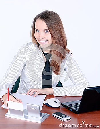 Attentive businesswoman signing document