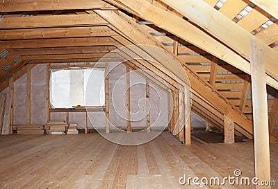 Attic in wooden house under construction overall view