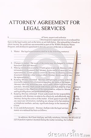 Attorney agreement for legal services form and pen. top view