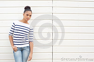 Attractive female fashion model against white background