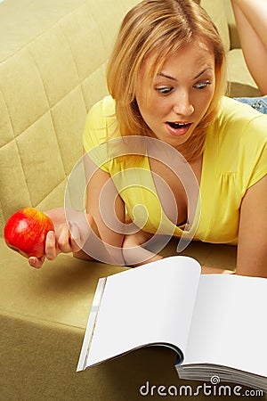The attractive Girl & red apple