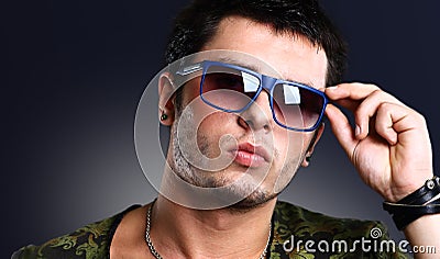 Attractive man dressed casual wearing glasses