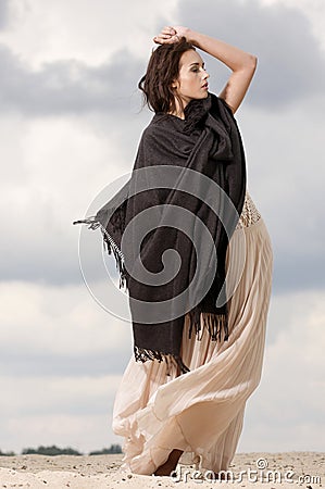 Attractive and sensuality woman in the desert