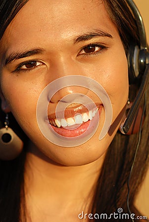 Attractive smiling telephone technical support wom