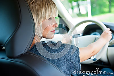 Attractive woman driver in her car