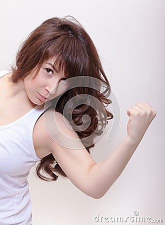  - attractive-woman-making-fist-29536632