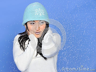 Attractive young Asian woman in indoor winter scene