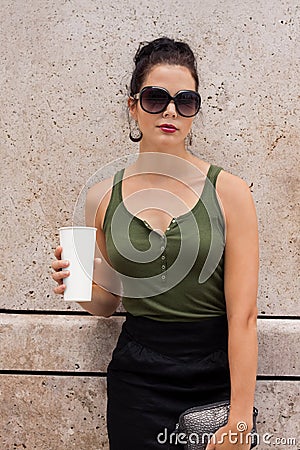 Attractive young woman with sunglasses outdoor