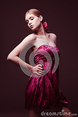 Attractive young woman wearing on pink dress
