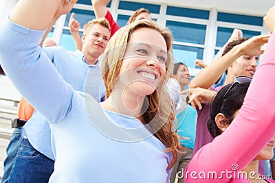 Audience Dancing At Outdoor Concert Performance