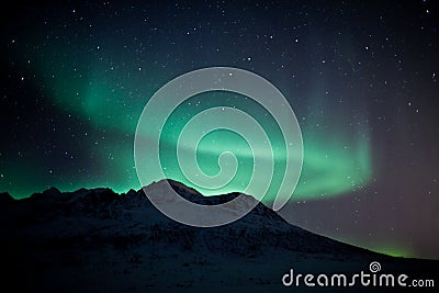 Aurora Borealis on Aurora Borealis Behind A Mountain Royalty Free Stock Photo   Image