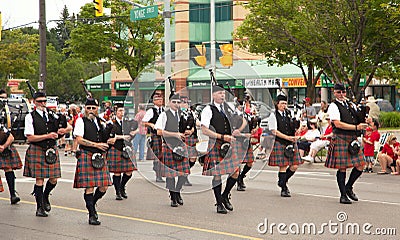 AURORA, ONTARIO, CANADA- JULY 1: Irishmen in their kilt playing their bagpipes during the Canada Day Parade