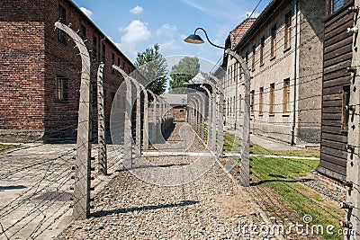 Auschwitz - buildings and barb wire fence
