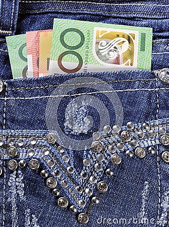 Australian money in back pocket of ladies jeans