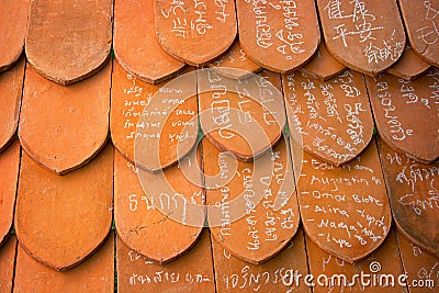 AYUTHAYA, THAILAND - 22 NOV 2013: Names written in chalk on clay