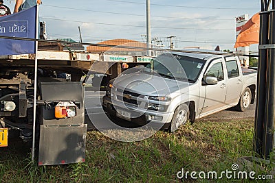 AYUTTHAYA, THAILAND - JULY 06: Rescue forces in a deadly car accident scene on July 06 2014. Road accident coupe gray hit the SUV