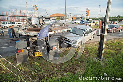 AYUTTHAYA, THAILAND - JULY 06: Rescue forces in a deadly car accident scene on July 06 2014. Road accident coupe gray hit the SUV