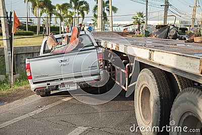 AYUTTHAYA, THAILAND - JULY 06: Rescue forces in a deadly car accident scene on July 06 2014. Road accident coupe gray hit the SUV
