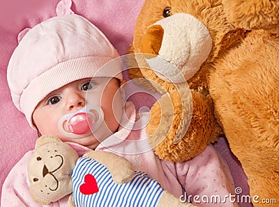 Baby with ​​teddy bear