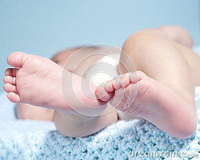 Baby feet baby boy on blue background