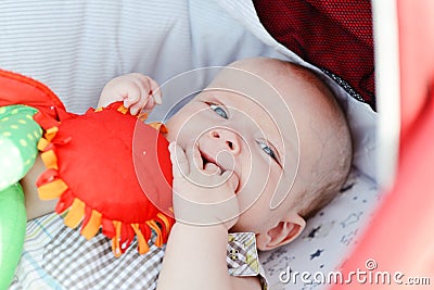 Baby with fingers in mouth