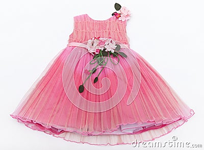 Baby pink dress with a bouquet on the belt