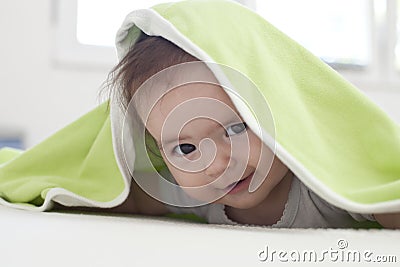 Baby under blanket