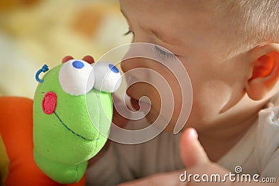 Baby watching for plush toy