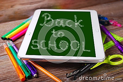 Back to school background with tablet pc