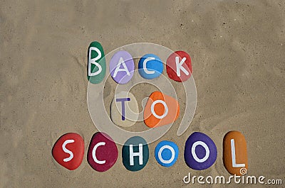 Back to school concept with colored stones composition