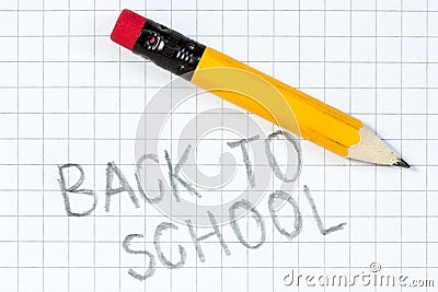Back to school written on a squared paper