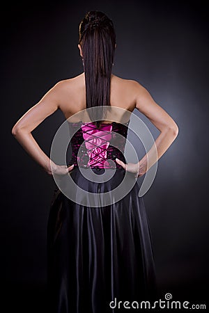 Back of a woman in cocktail dress