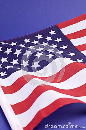 Background close up of USA Stars and Stripes flag - vertical