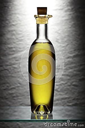 Backlit olive oil bottle