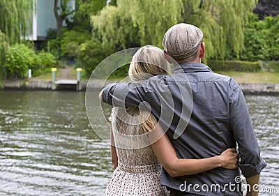 Backside of a couple in a park