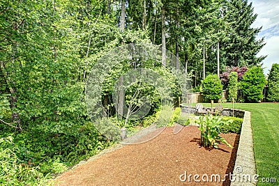 Backyard landscape design with greenbelt