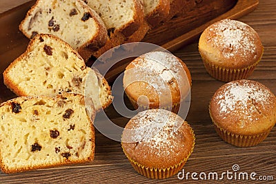 Baked cake and mini muffins with raisins