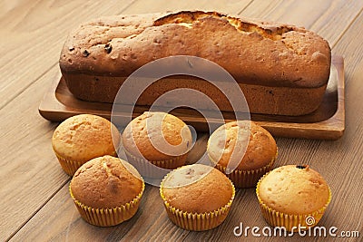 Baked cake and mini muffins with raisins