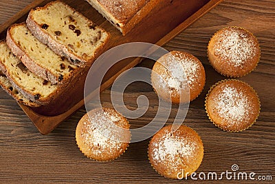 Baked cake and mini muffins with raisins